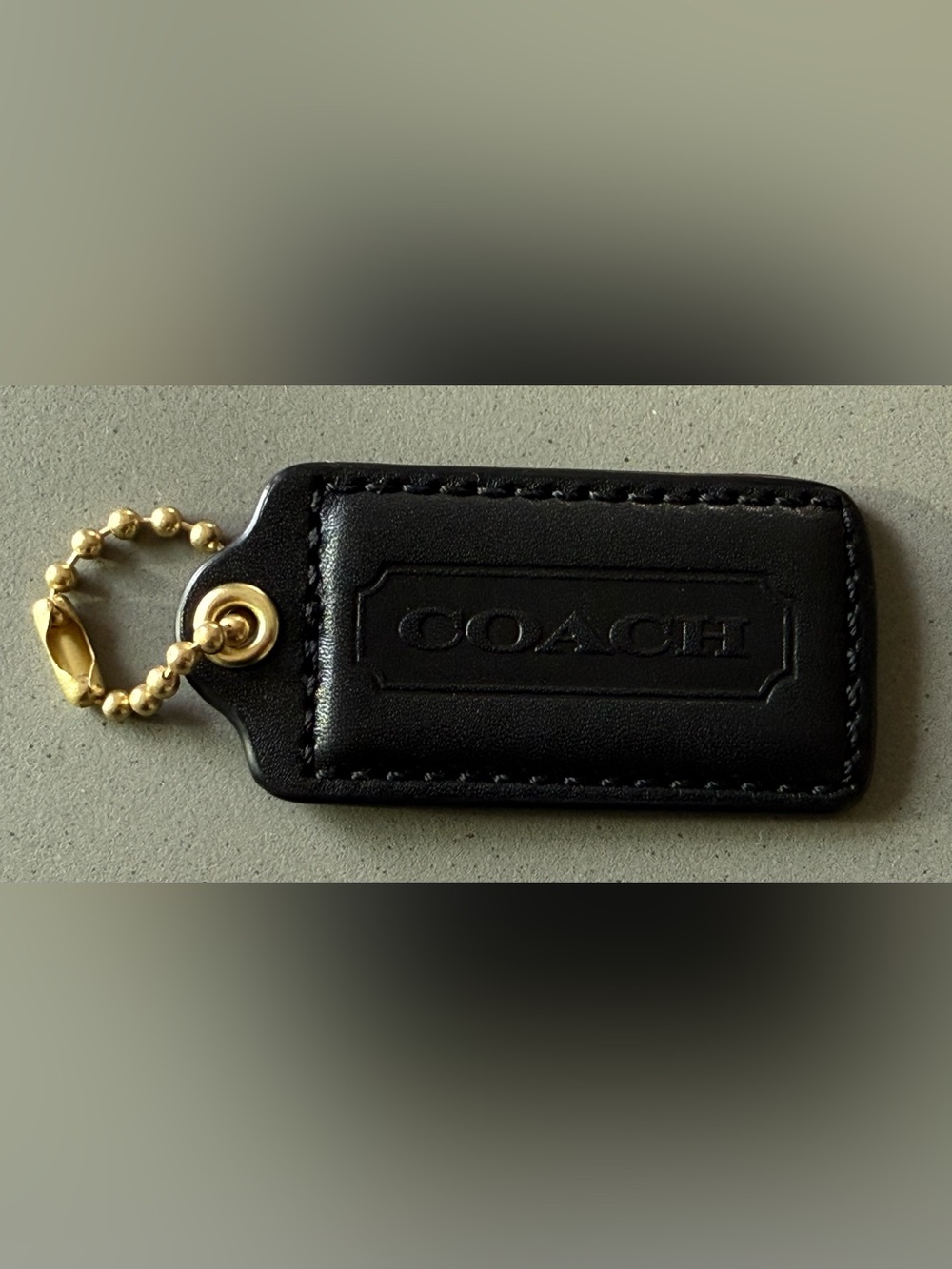 Coach leather tag